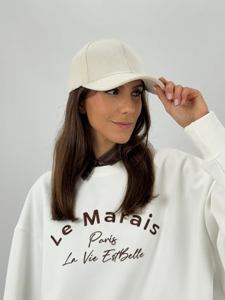 Chapeau en fausse fourrure beige