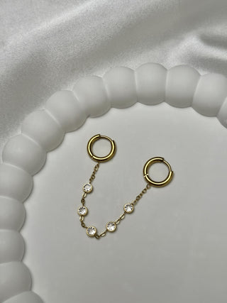 Boucle d'oreille double avec chaîne en or
