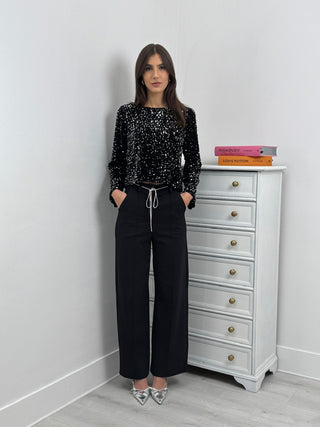 Pantalon Palazzo noir avec ceinture en strass
