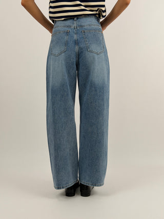 Jeans Criss Cross con Chiusura Incrociata