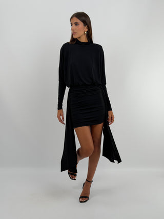 Abito Corto con Drappeggio Nero Lumina - Abito corto nero in tessuto elasticizzato, con spalline imbottite, maniche lunghe, collo a lupetto e gonna con arricciature e drappeggi laterali. | Paloma Store