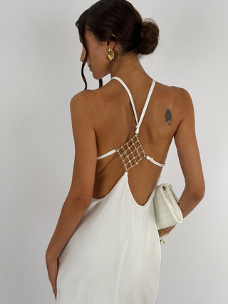 Abito Gioiello in Satin Bianco - Abito lungo bianco in tessuto satinato con spalline sottili e applicazione gioiello sul retro. | Paloma Store