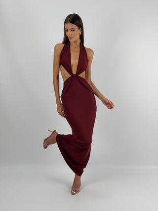 Abito Lungo con Cut Out Burgundy - Abito lungo burgundy in tessuto elasticizzato, con cut out laterale e scollo a V. | Paloma Store