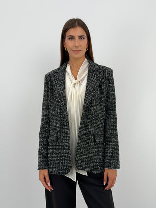 Blazer in Tweed Nero - Blazer monopetto nero in tweed con revers, bottone centrale e fodera interna. | Paloma Store