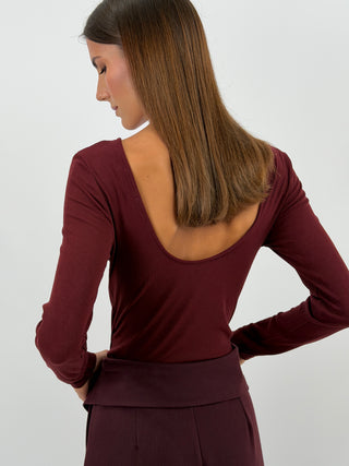 Body con Schiena Scoperta Bordeaux - Body bordeaux a costine con maniche lunghe e scollo ampio sul retro. Chiusura con gancetti sul fondo. | Paloma Store