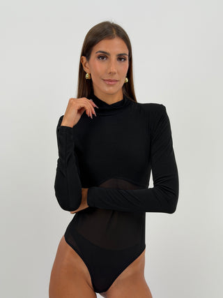 Body Maniche Lunghe con Tulle Nero Lumina - Body nero in tessuto elasticizzato, con fondo in tulle tono su tono, spalline imbottite e collo alto. Chiusura con bottoncini sul fondo. | Paloma Store