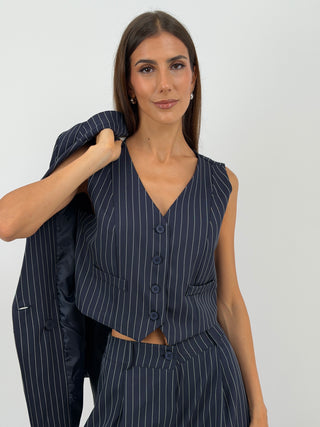 Gilet Gessato Blu - Gilet gessato blu senza maniche, con scollo a V. Fodera interna, finte tasche a filetto e chiusura frontale con bottoni. | Paloma Store