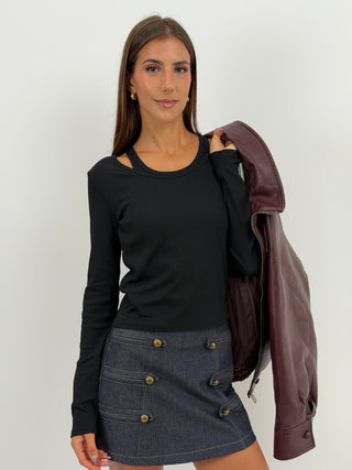 Set Maglia e Canotta a Costine Nero - Set due pezzi nero: maglia a maniche lunghe a costine e canotta abbinata. | Paloma Store