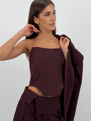 Top Corsetto Bordeaux Lumina - Top corsetto bustier bordeaux con struttura a stecche verticali frontali e posteriori. Senza spalline, con fondo inferiore sagomato e chiusura posteriore con zip. | Paloma Store
