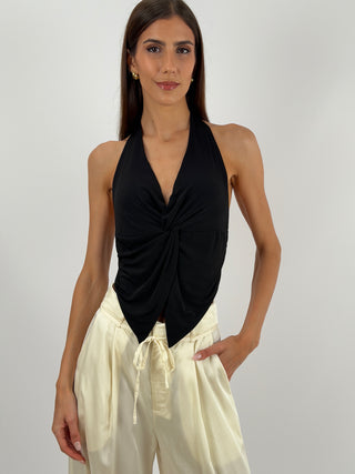 Top Halter Nero con Dettaglio Gioiello - Top elasticizzato nero con allacciatura al collo, schiena scoperta, dettaglio gioiello dorato sul | Paloma Store